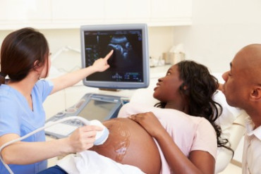 Pregnant-Woman-And-Partner-Having-4D-Ultrasound-Scan-000030873454_Small.jpg